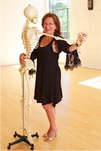 woman dancing with skeleton