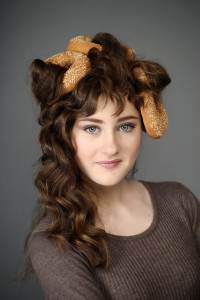 girl with bagels in hair