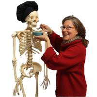woman feeding skeleton