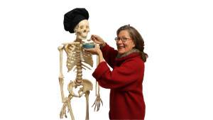 woman feeding skeleton fullsize