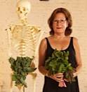woman holding plants with skeleton