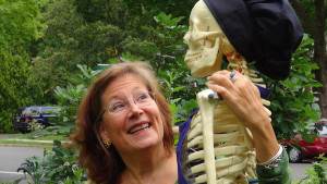 woman hugging skeleton