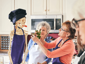 Irma Feeding Skelly some Vegetables