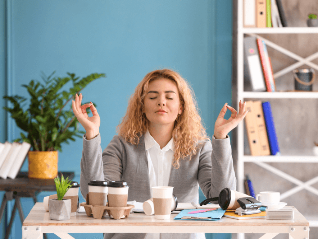 Working Lady Meditating in Her Desk after a Meal